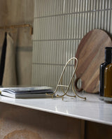 FAILA bogstøtte - guld finish - nordal.dk